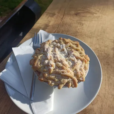 Apple crumble pie with a golden lattice top