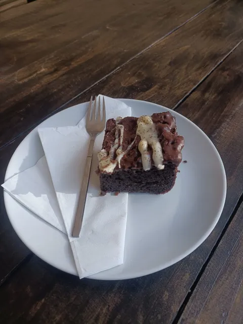 Fudgy chocolate brownie with chocolate and white chocolate drizzle