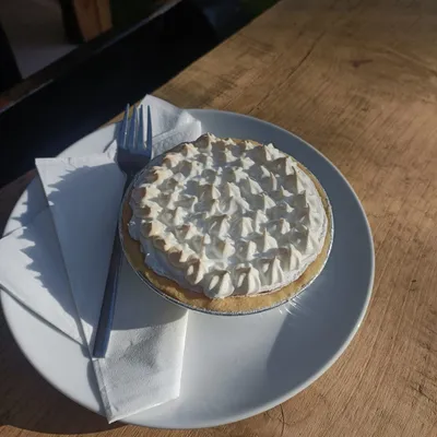 Lemon meringue pie with torched peaks